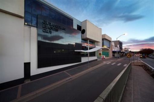 The Queanbeyan Leagues Club building on Monaro Street at dusk